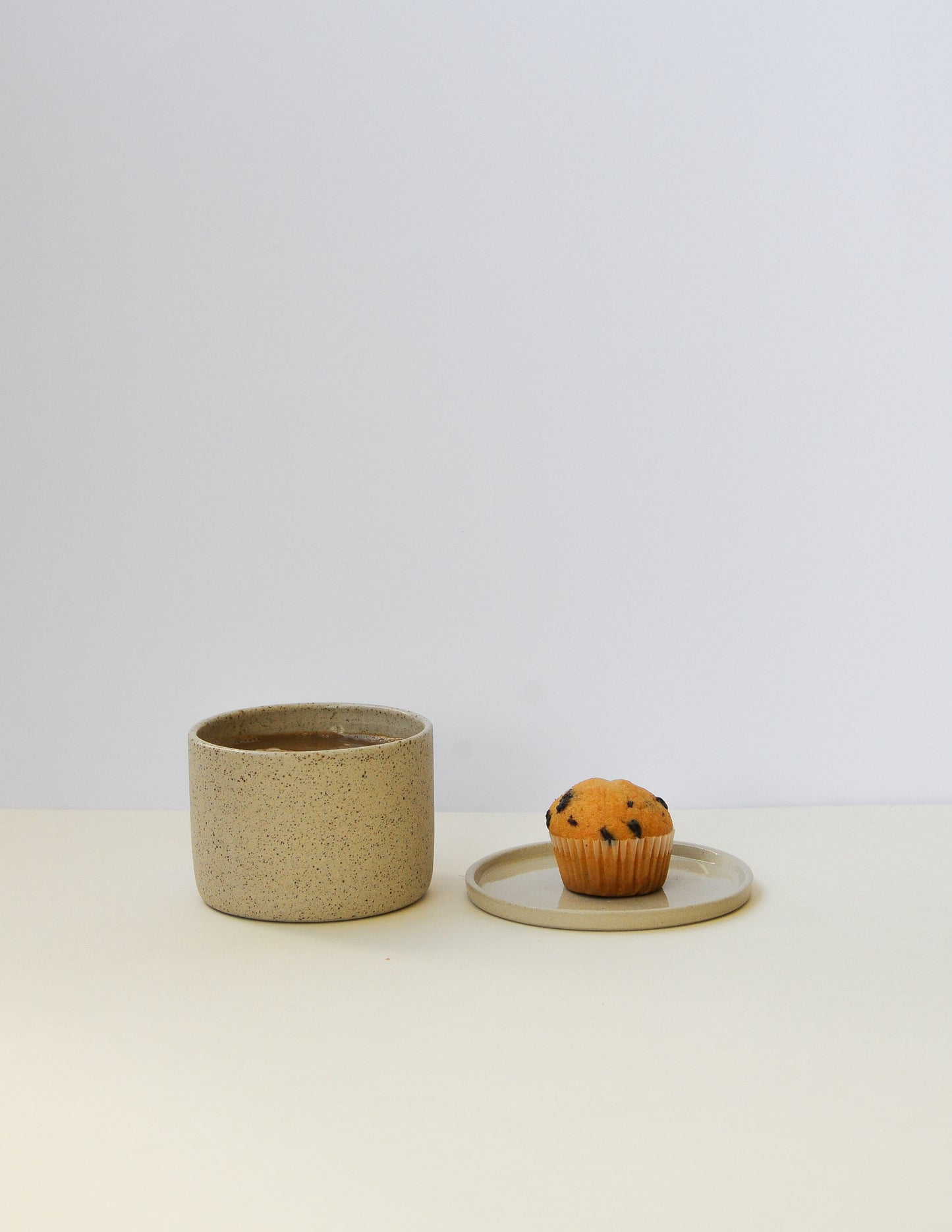 SAND Becher mit Untertasse