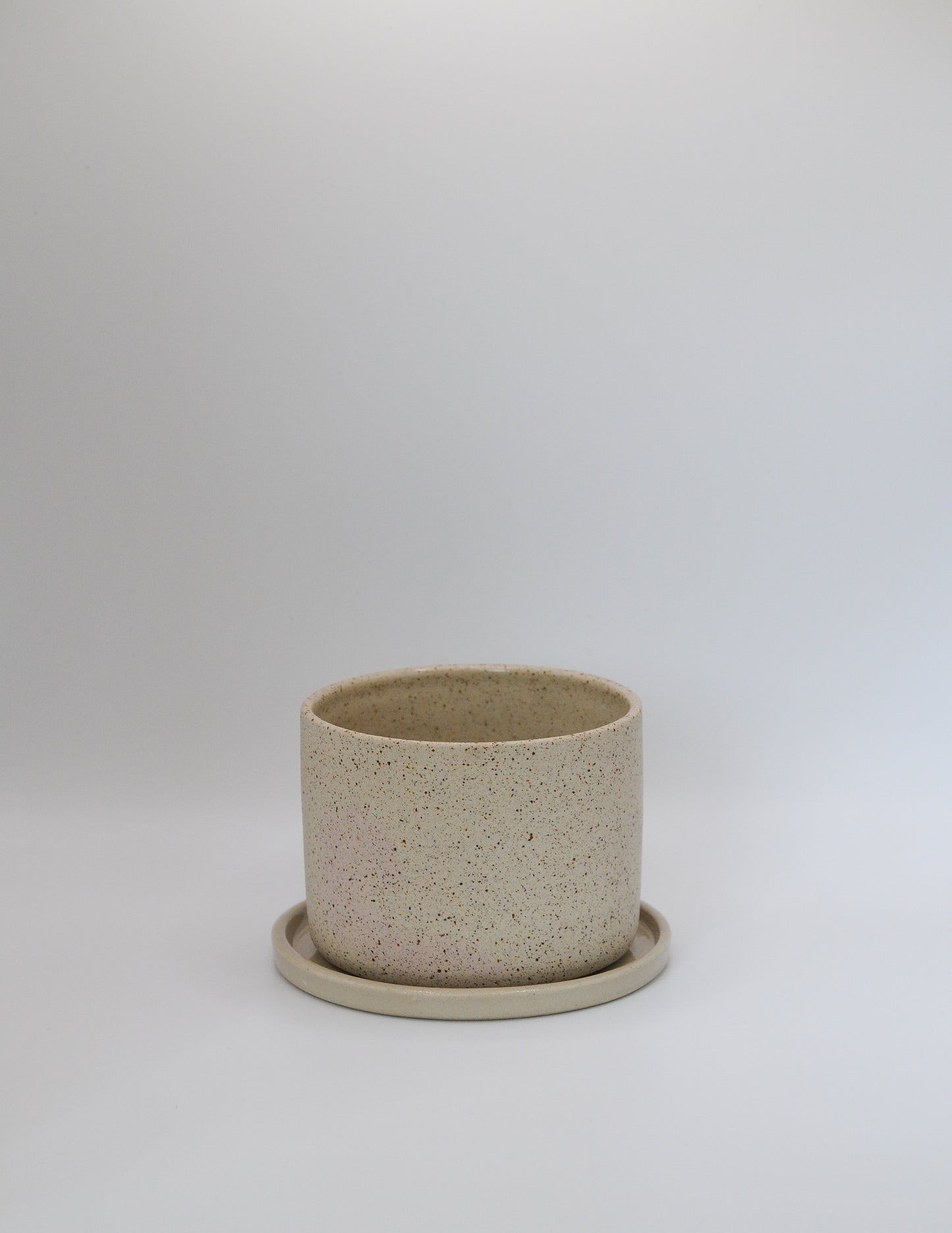 SAND Becher mit Untertasse