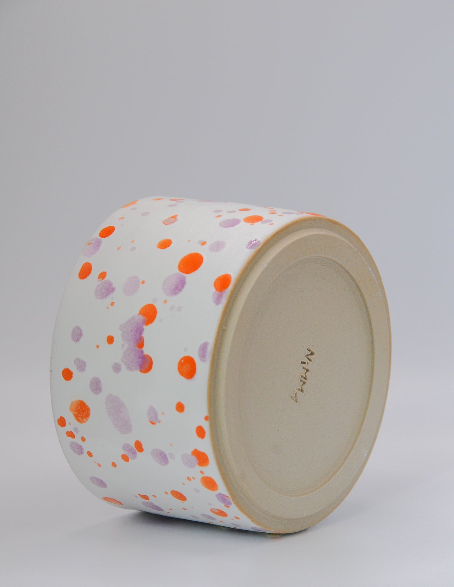 KONFETTI Becher lila orange